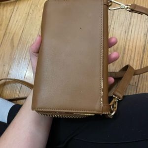 It’s a crossbody wallet
